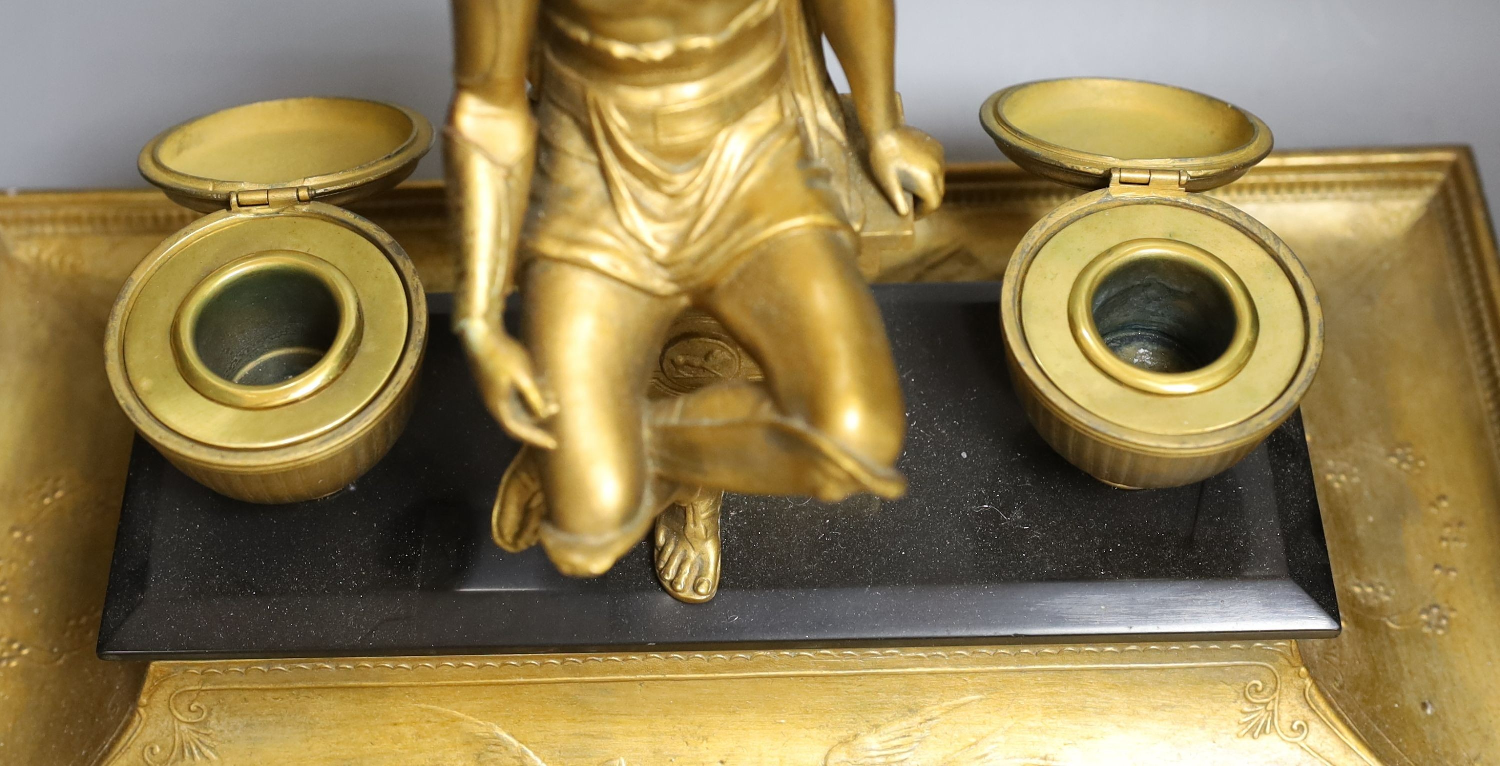 A decorative gilt inkstand depicting a Roman gladiator - 33cm tall